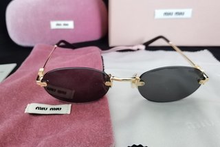 Gafas de sol Miu Miu originales modelo oval dorado