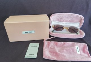 Gafas de sol Miu Miu originales modelo oval dorado