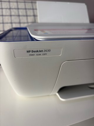 Impresora HP Instant Ink azul y blanca