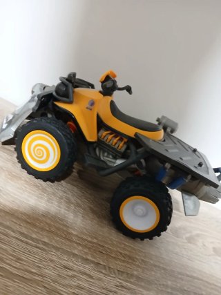 Quad de juguete con diseño de tiburón