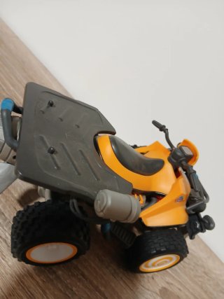 Quad de juguete con diseño de tiburón