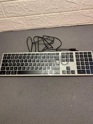Teclado ingles con cable