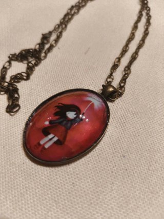 Collar con colgante de niña con paraguas