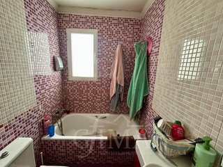 Casa adosada en venta en Tomelloso