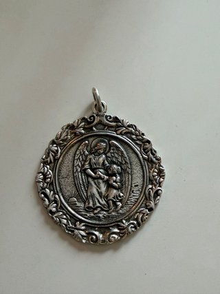 Dos medallas religiosas plata