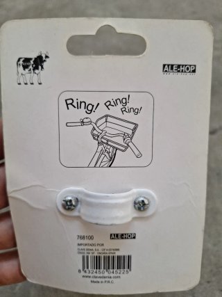Timbre de bicicleta blanco con puntos negros