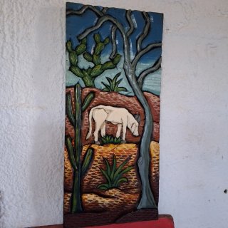 Talla de madera desierto con vaca