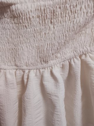 Falda blanca con volantes
