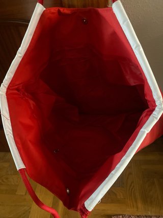 Bolsa de playa roja Banco Santander.
