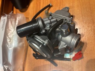 Carburador y espejos moto nuevos