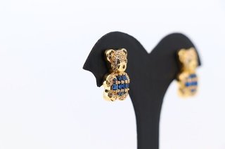 PENDIENTES OSO CON CIRCONITAS AZUL.