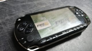 Lote Sony PSP con juegos y accesorios