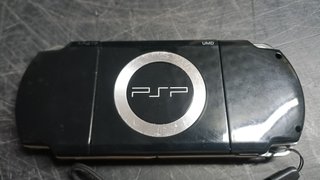 Lote Sony PSP con juegos y accesorios