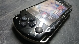Lote Sony PSP con juegos y accesorios