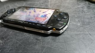 Lote Sony PSP con juegos y accesorios