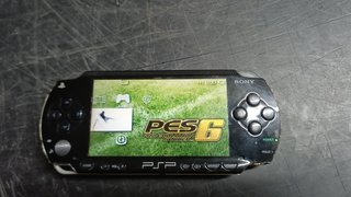 Lote Sony PSP con juegos y accesorios
