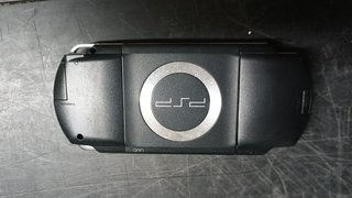 Lote Sony PSP con juegos y accesorios