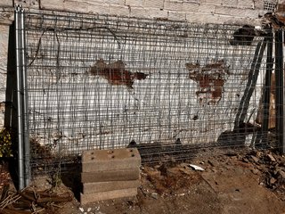Valla de obra y pies
