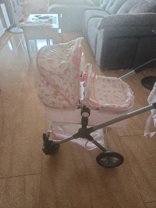 Carrito de muñecas rosa
