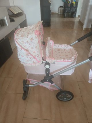 Carrito de muñecas rosa