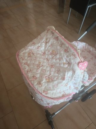 Carrito de muñecas rosa