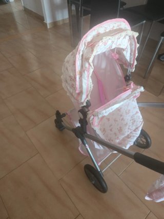 Carrito de muñecas rosa