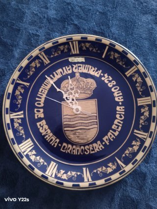 Reloj de Pared Azul y Dorado