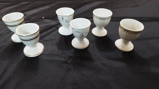 Lote 5 hueveras porcelana antiguas doradas