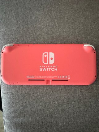Nintendo Switch Lite Coral + Accesorios y juegos