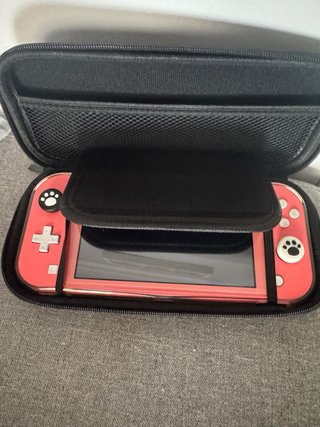 Nintendo Switch Lite Coral + Accesorios y juegos