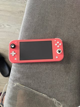 Nintendo Switch Lite Coral + Accesorios y juegos