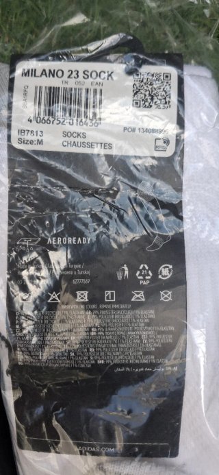 Pack calcetines Adidas sin abrir y espinilleras