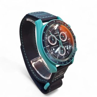 RELOJ SWATCH OMEGA SPEEDMASTER MISSION TO EARTH + CAJA