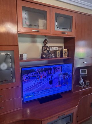 Mueble de salón madera y cristal