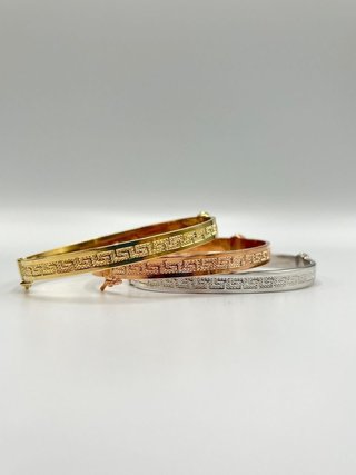 SEMANARIO 3 PULSERAS RIGIDAS GRECA HUECA. ORO 18K