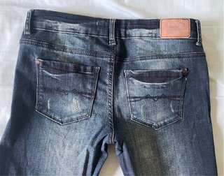 Pantalón vaquero desgastado chica T-M