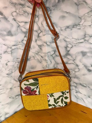 Bolso estampado leopardo con neceser