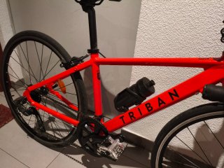 Bicicleta carretera niño Triban roja