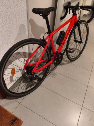 Bicicleta carretera niño Triban roja