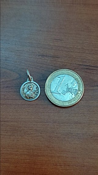 Medalla pequeña plata