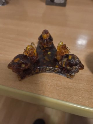 Figura ámbar cobras con esfera