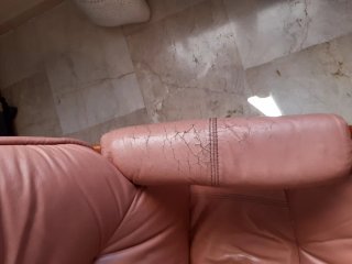 Sillón reclinable de cuero con reposapiés