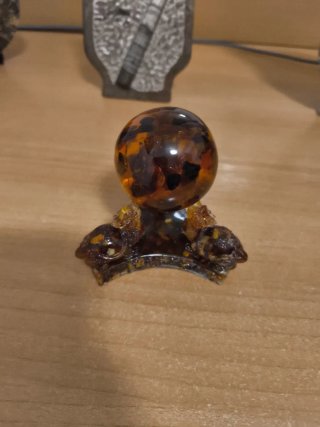 Figura tortugas de ámbar con esfera
