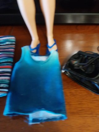 Ken Mattel con outfit e accessori