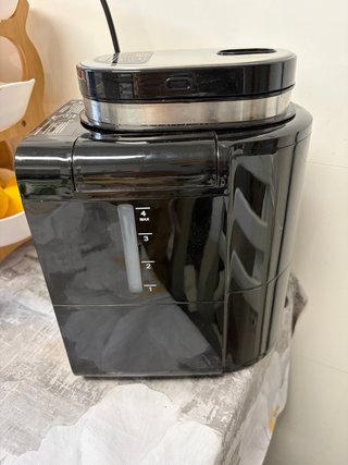 Cafetera con molinillo CASO