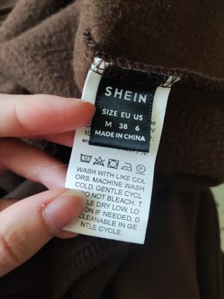 Sudadera marrón con cremallera