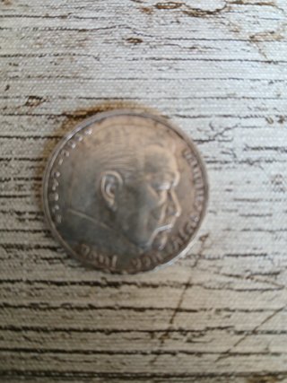 Moneda antigua con retrato