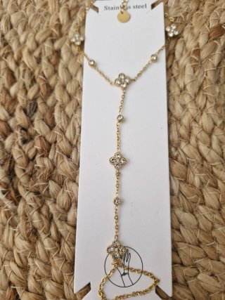 Pulsera esclava dorada con tréboles