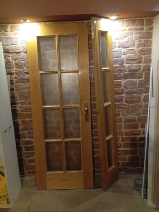 Puerta doble de madera maciza con cristales