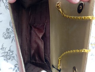 Cartera de fiesta dorada